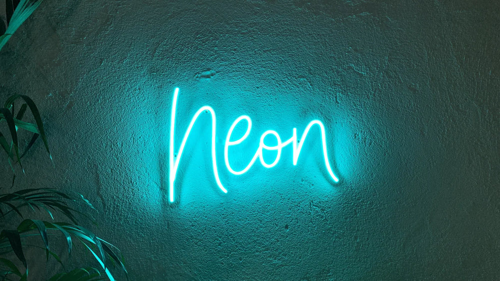 Custom script neon sign whose wording was fixed when the tube was formed