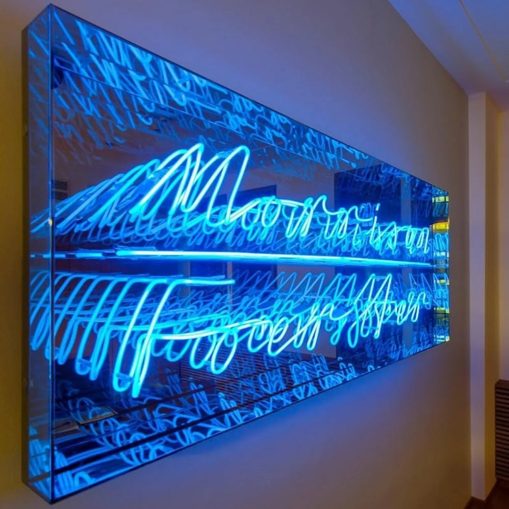 Custom neon infinity mirror wall piece used as art rather than lettering