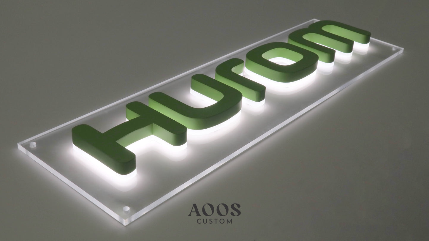 Custom LED Backlit Channel Letters, Cool White Under Glow Lighting, Matte Green Finish, Mounted on Clear Acrylic Backboard