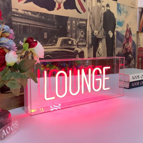 Custom LED neon box sign with illuminated Lounge lettering inside a clear acrylic case for tabletop bar or reception display