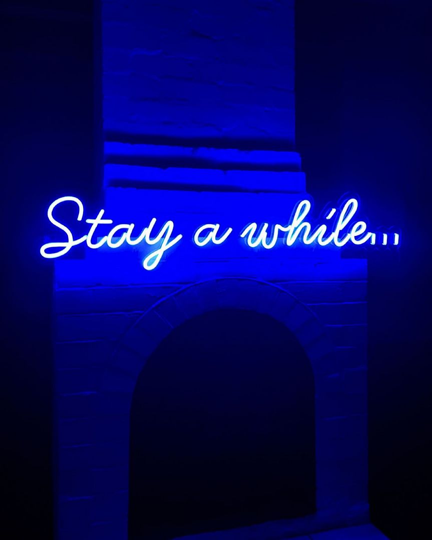 Stay a While Neon Sign