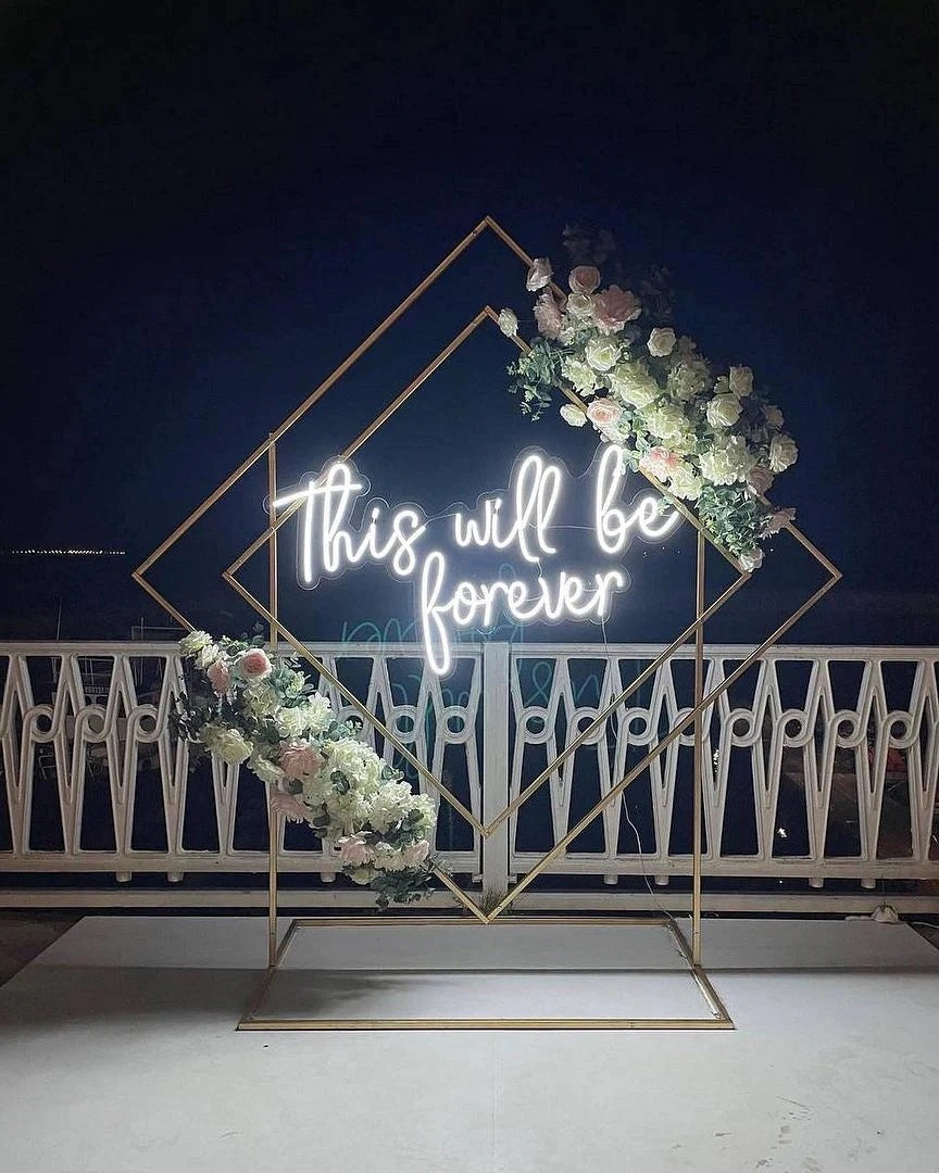 Make Your Wedding Unforgettable with a Custom Sign on a Floral Circle Arch