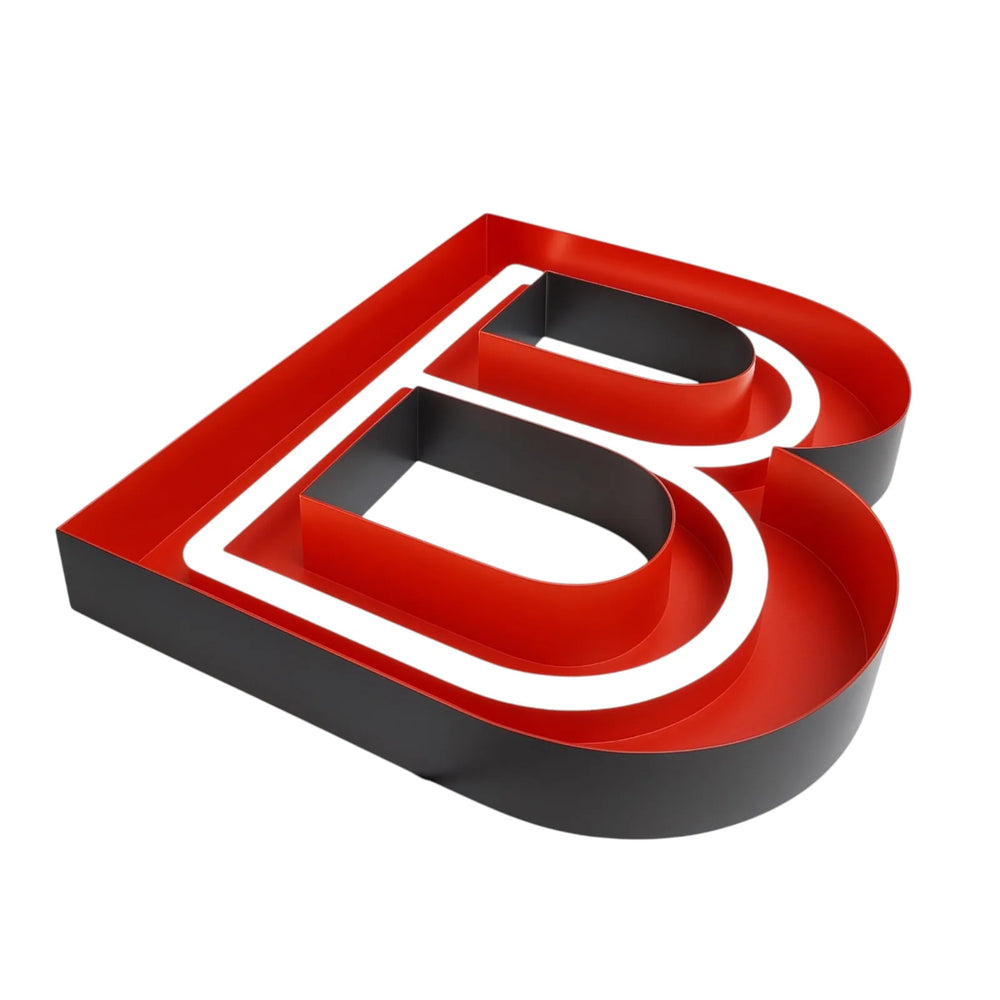 Three dimensional view of a channel letter showing the face, the returns and the can behind it