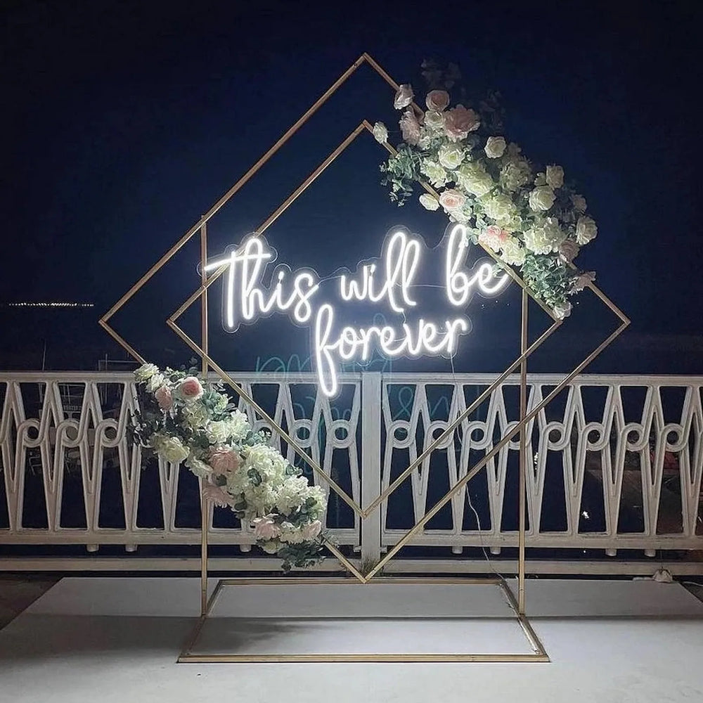 Custom neon sign reading a romantic phrase, used for an engagement