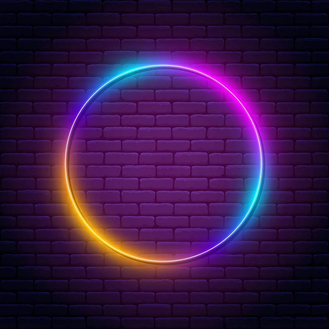Custom RGB gradient color changing LED neon sign in a circular ring design with multicolor glow on a dark brick wall