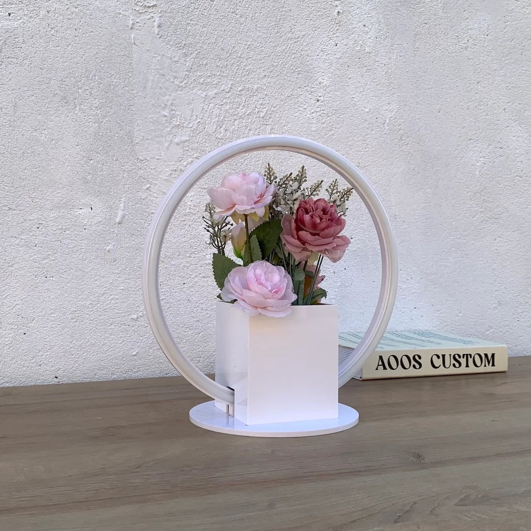 Aoos LED neon ring centerpiece with floral arrangement in vase