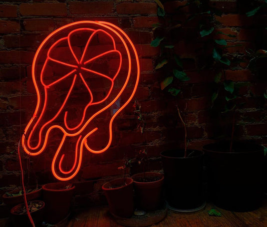 Dripping Orange Neon Sign
