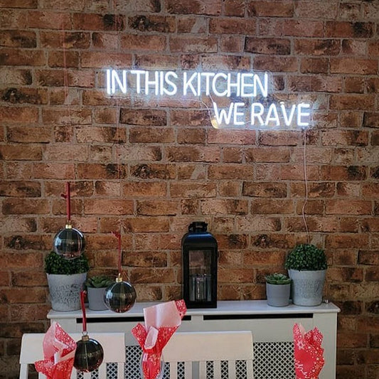 In This Kitchen We Rave Neon Sign