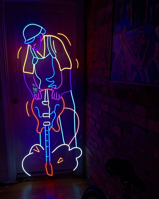 Man Drilling Guitar Neon Sign