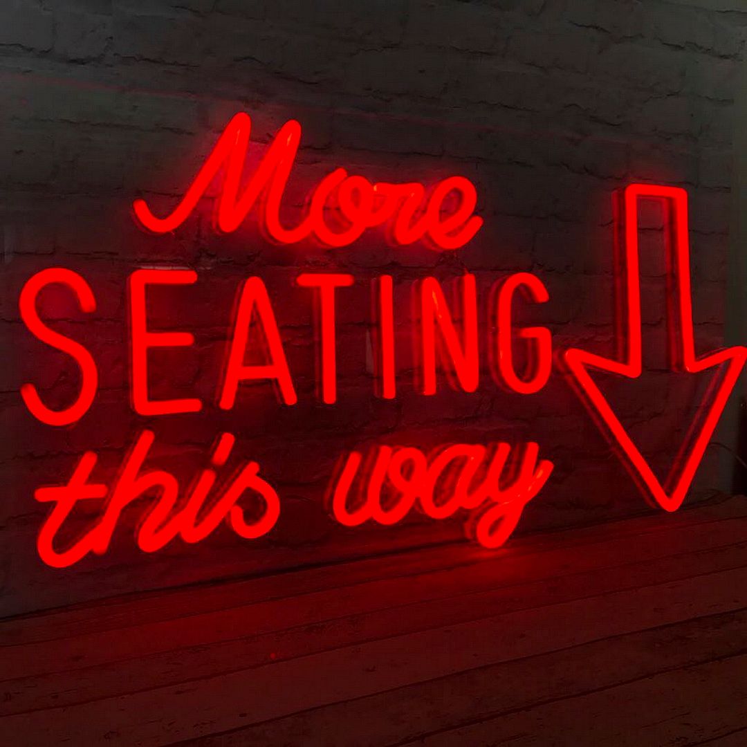 More Seating This Way Neon Sign