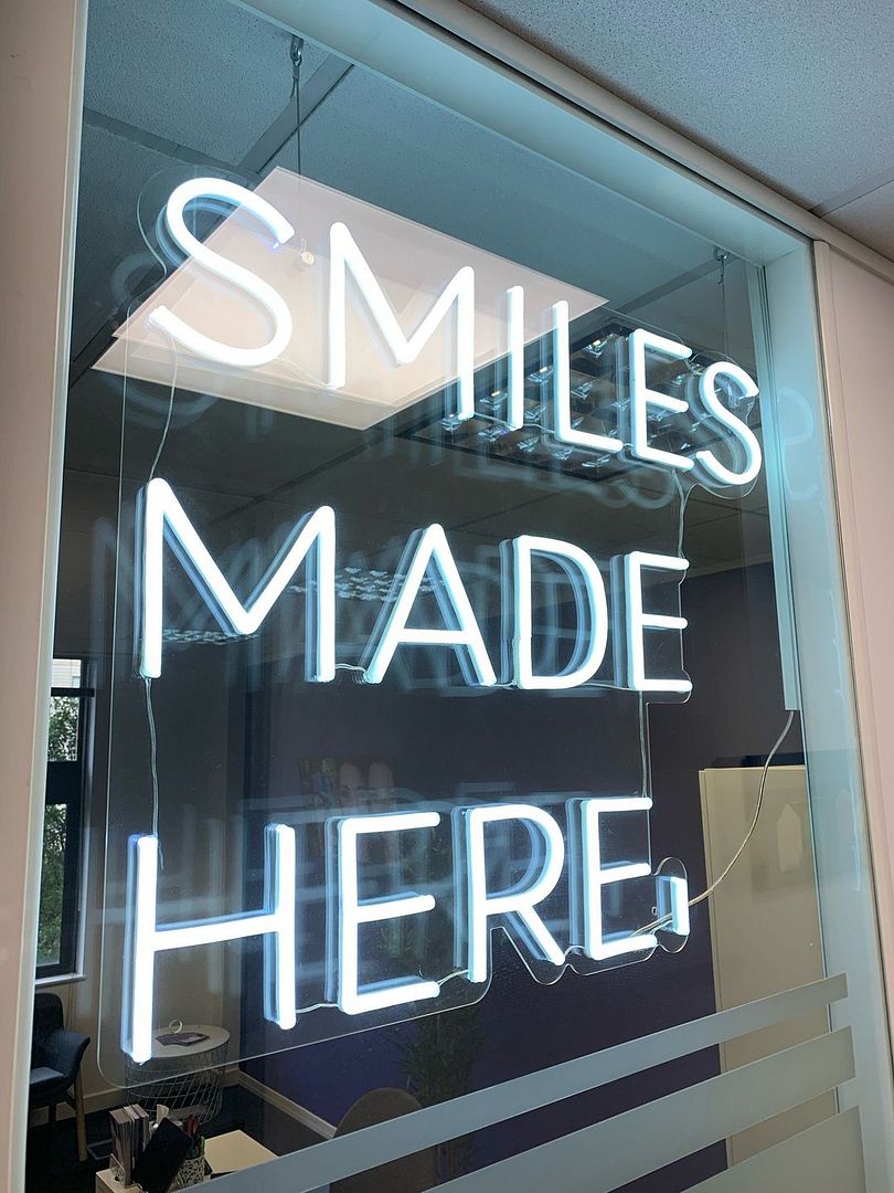 Smiles Made Here Neon Sign