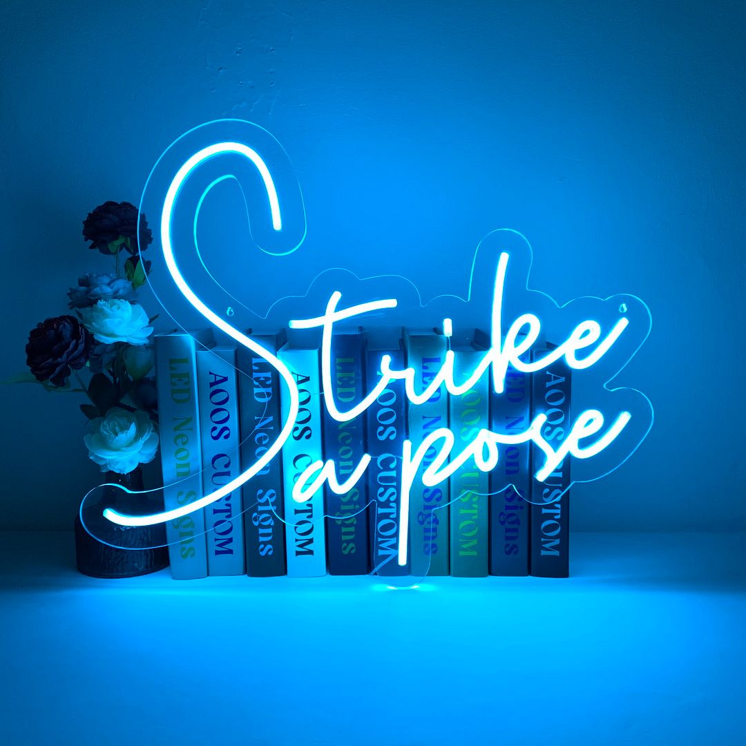 Strike a Pose Neon Sign