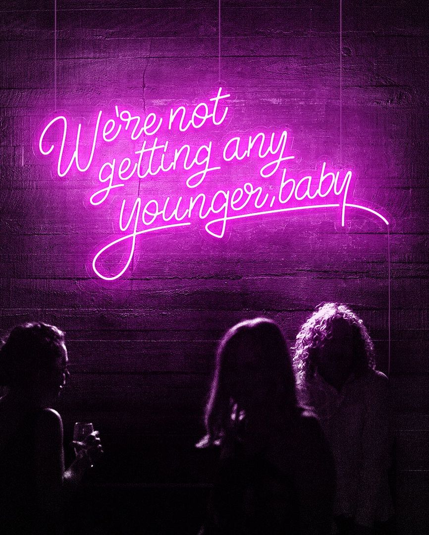We're Not Getting Any Younger Baby Neon Sign
